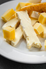 Cheese plate French cheeses fresh tasty food dish delicious gourmet food background on the table rustic food top view copy space