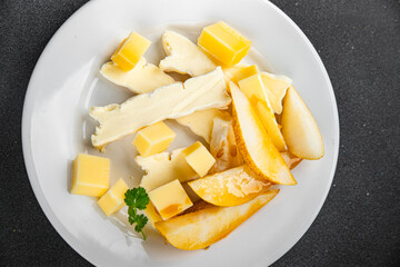 Cheese plate French cheeses fresh tasty food dish delicious gourmet food background on the table rustic food top view copy space