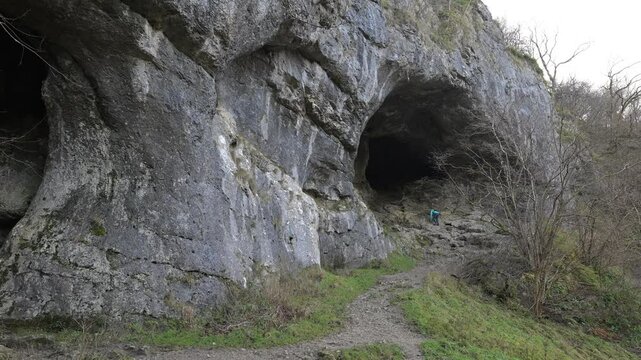 Adele, climbing into Reynard's Cave.