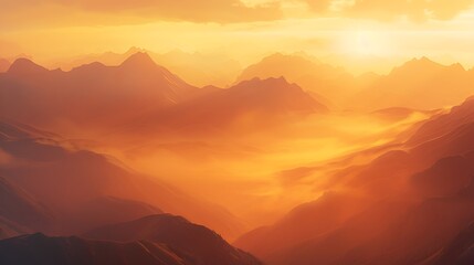 Fototapeta premium A stunning sunrise over a range of mountains, with the first light of day illuminating the peaks and valleys in a golden glow