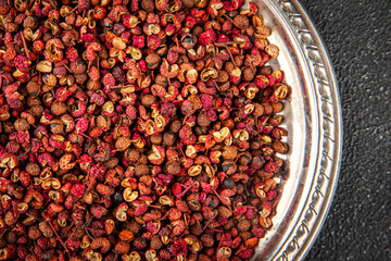Sichuan pepper spice pepper peas fresh tasty food gourmet food background on the table rustic food top view copy space