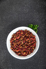 Sichuan pepper spice pepper peas fresh tasty food gourmet food background on the table rustic food top view copy space