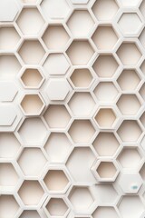 Naklejka premium Geometric white honeycomb pattern with varying hexagonal shapes creating a modern and minimalist aesthetic.