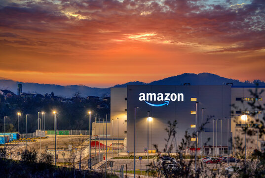Amazon logistics warehouse in Siero, Asturias in Spain at sunset.