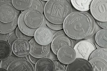 Big pile of different coins from various time period in Ukraine. Shiny Ukrainian money background