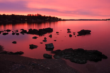 sunrise over calm water - Lysaker