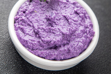 purple mashed potatoes fresh tasty food dish delicious gourmet food background on the table rustic food top view copy space keto and paleo diet Vegetarian and vegan food