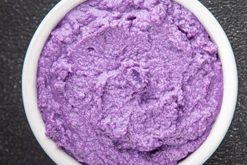 purple mashed potatoes fresh tasty food dish delicious gourmet food background on the table rustic food top view copy space keto and paleo diet Vegetarian and vegan food