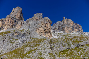 Dolomites sunny weather in summer mountains. Green valley and beautiful mountain rocky peaks in the Alps. Alpine scenic landscape in South Tyrol region in Italy