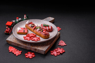 Sweet eclair with chocolate filling, decorated for Christmas