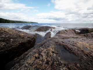 The movements of waves at the shoreline of the Swedish lake Vättern in the southern Sweden. 