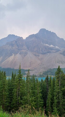 Peyto Lake in Banff National Park, Alberta. Glacier-fed lake with a unique wolf-head shape and vivid turquoise color. In Canadian Rockies, a popular tourist viewpoint along the Icefields Parkway.