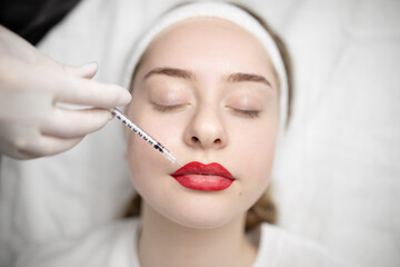 Two ladies are experiencing a pampering session in a beauty salon, undergoing a procedure for...
