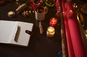 Christmas wrapping supplies and notebook