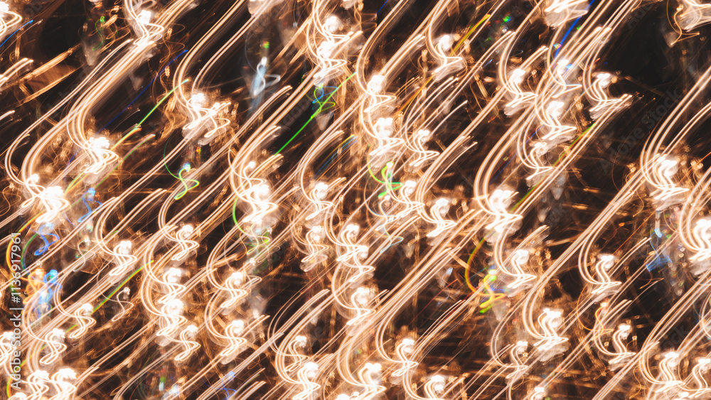 Wall mural a abstract blurry image of lights and shadows. the lights are in different colors and are scattered 