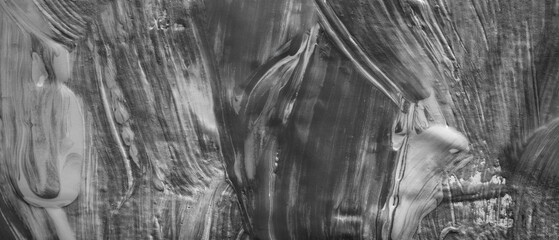 A painting of a person with a brush. The brush strokes are very thick and the painting is in black and white