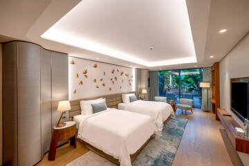 Modern hotel room with a bright and airy feel, a luxury hotel room. Example of a hotel room, modern furnishings and architecture.