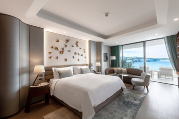 Modern hotel room with a bright and airy feel, a luxury hotel room. Example of a hotel room, modern furnishings and architecture.