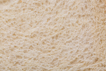 Close up shot of a bread background texture. Macro bread slice texture pattern
