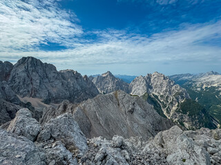 Panoramic view of rugged mountain ridge Lipnica seen from top of summit Spik, wild Julian Alps....