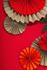 Happy Chinese New Year traditional concept. Oriental asian style paper fans on red background
