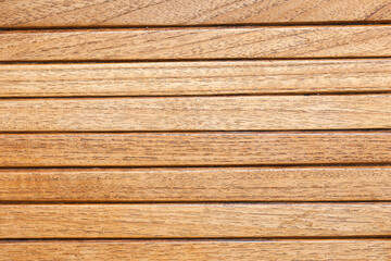 Fototapeta premium Closeup of wooden texture with natural grain. Aged and vintage timber planks. Brown wood surface for rustic wall or flooring design. Natural hardwood pattern for decorative backdrop.