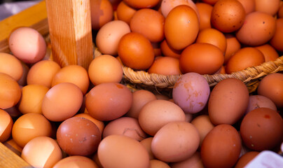 Farm fresh eggs in basket closeup. High quality photo