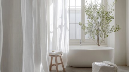 Luxurious minimalist bathroom with freestanding tub, linen curtains, and natural light.