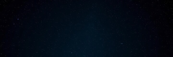 Fototapeta premium Night sky filled with sparkling stars against a black background, starlit, space, night time