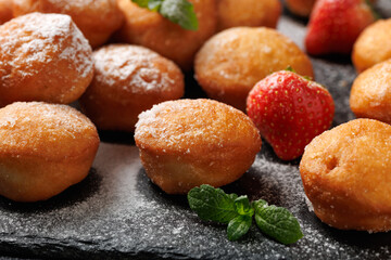 Mini Strawberry Doughnuts on stone board