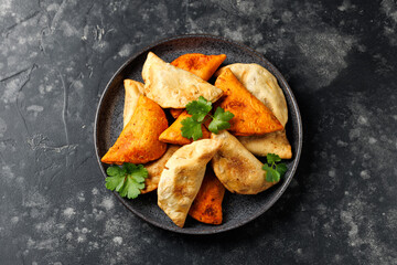 Freshly served traditional empanadas in a plate. Mexican food