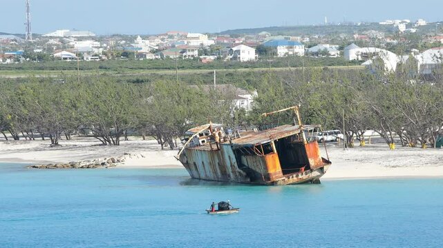 Rusting hulk of a shipwreck sits on the shore of Grand Turk from Hurricane damage.