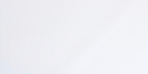 Smooth white paper sheet background with a clean and minimalist look, smooth, surface, close-up