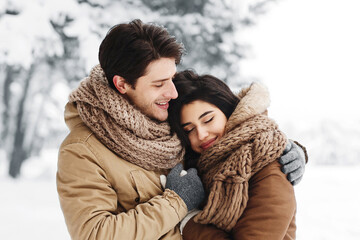 Winter Morning Date. Sweet Couple Hugging Standing In Snowy Forest Walking Outdoor