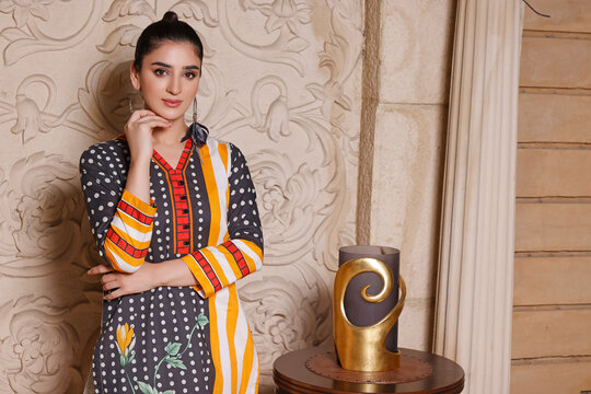 A Pakistani Model is wearing traditional dress Shalwar kameez - Kurti