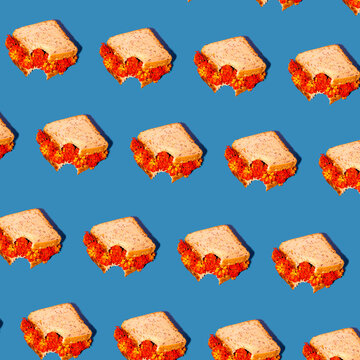 Colorful sandwiches pattern on a vibrant blue background
