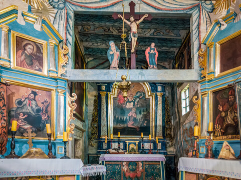 Sanok, Poland - May 4, 2024. Interior of the Wooden Greek Catholic Church of St. Onufry the Hermit of 1750 from Rosolin in the Museum of Folk Architecture in Sanok.