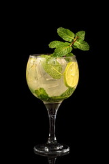 Mojito, classic Cuban drink with rum, ice and mint leaves