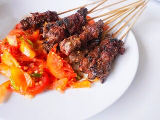 Close up of delicious beef satay called 