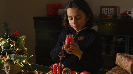 Girl Holding Candle During Christmas