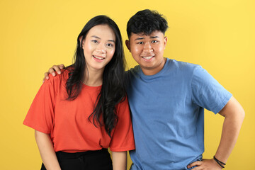 Fototapeta premium Lovely Young Happy Smiling Asian Couple in T Shirt Clothes