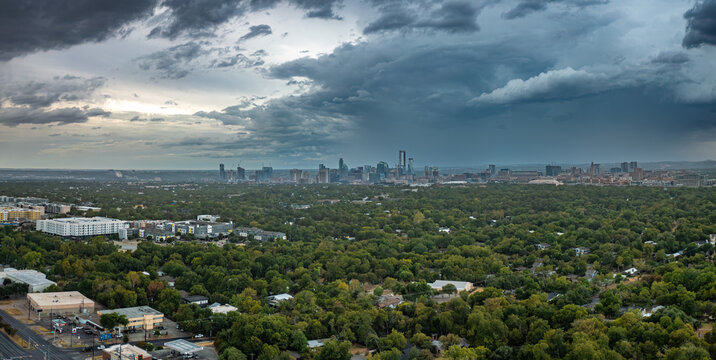 Panoramic view from Mueller of storm rolling in over downtown Austin, Texas skyline