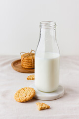 Bottle of fresh milk with oatmeal cookies
