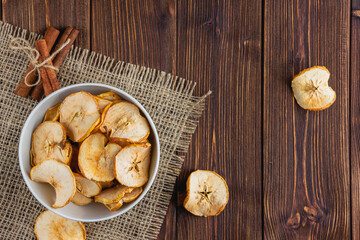 Fototapeta premium Dried sliced apples in a white bowl