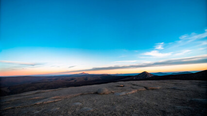 Scenic Mountain Road at Sunset with Clouds and Horizon View1