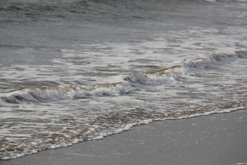 Image of waves crashing at Dadaepo Beach in Busan
