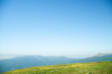View of mountain landscape from the height of the mountain range.