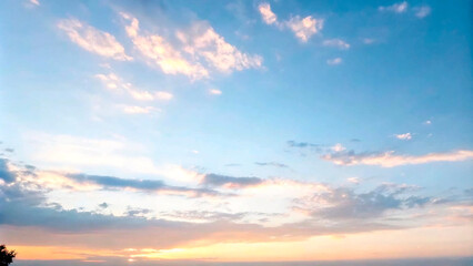 Obraz premium A beautiful sunrise and sunset over the sea with sun rays piercing through clouds in a colorful sky6