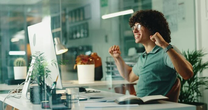 Man, celebration and computer in office with fist, pump and excited for goals with bonus at web design startup. Person, applause and cheers for success, achievement or promotion at creative agency