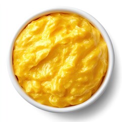 A bowl of creamy, yellow mashed food, resembling a soft and smooth texture.